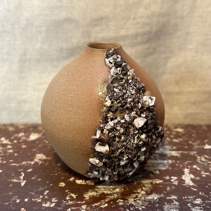 Buclatá vázička Země